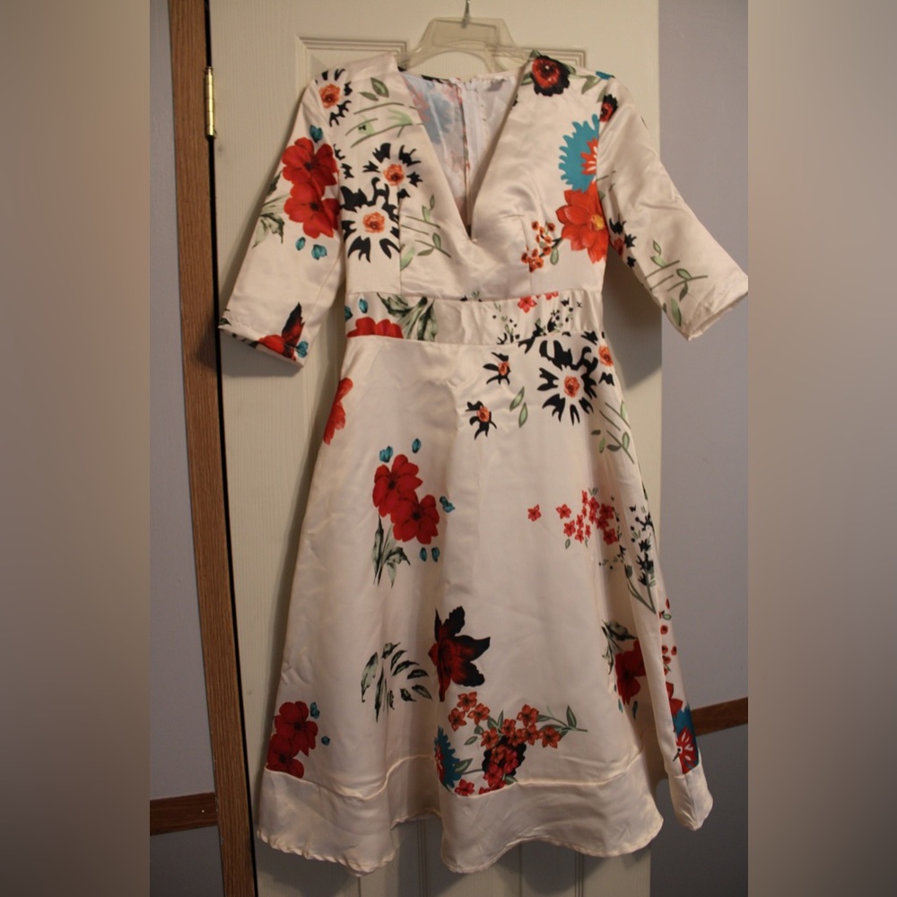 Floral, v-neck dress. Very elegant.